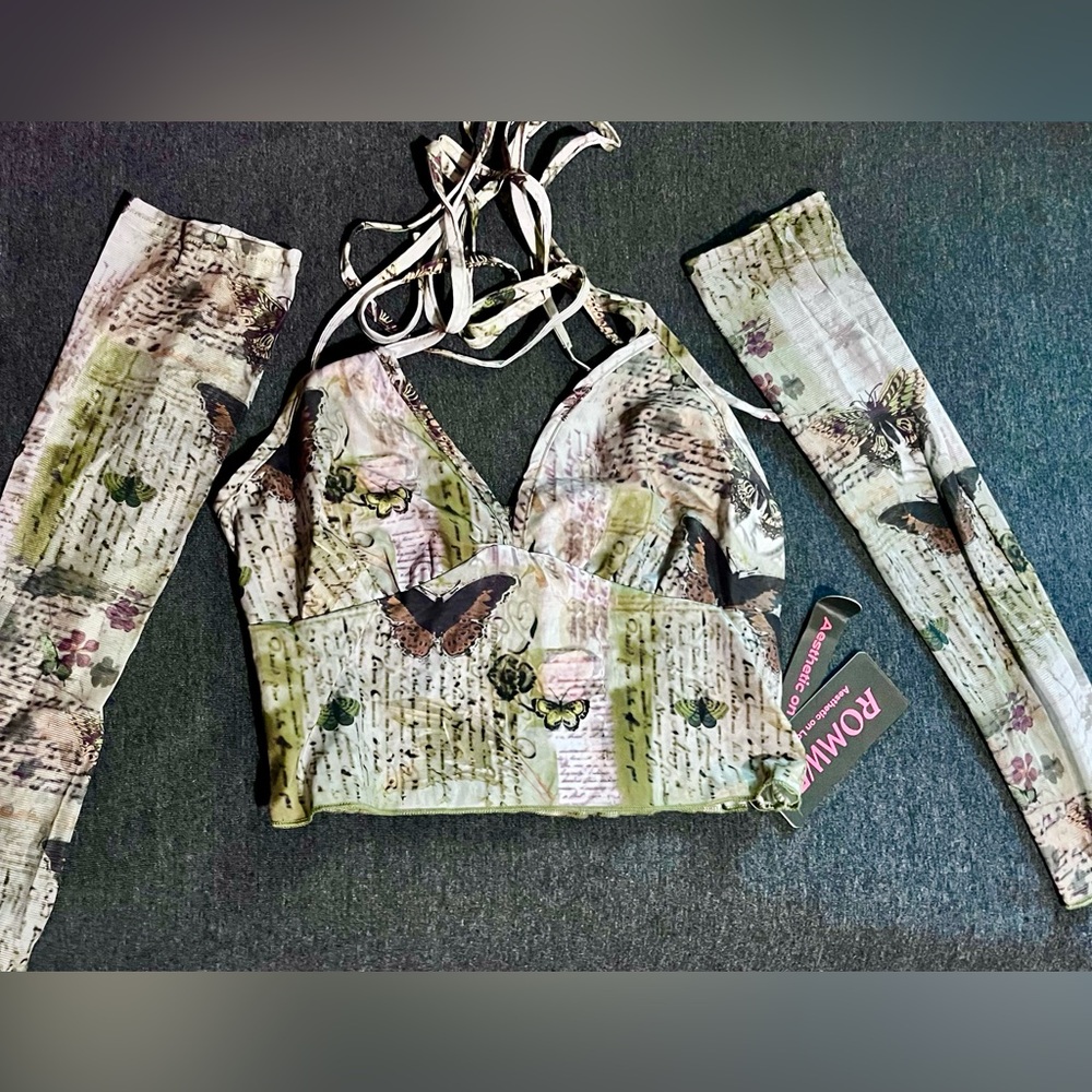 Green top with additional sleeves
